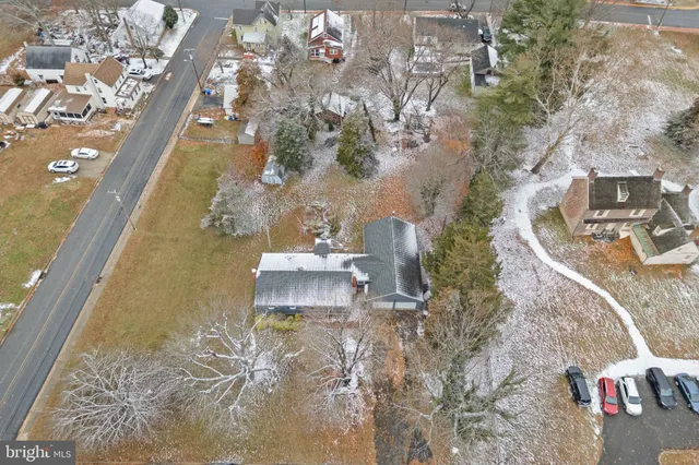a picture of floor to ceiling window with yard