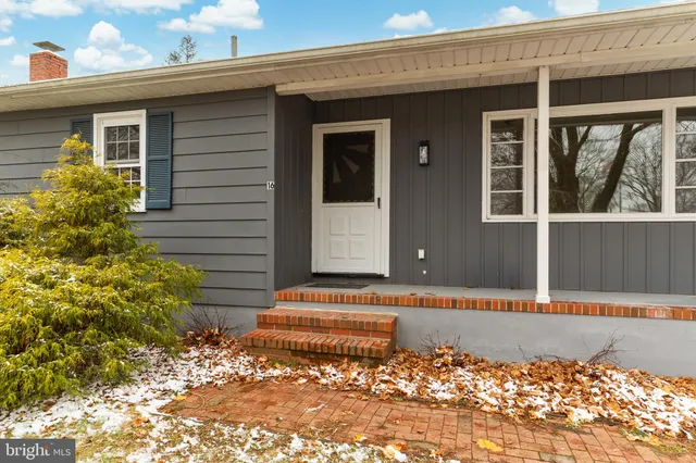 a front view of a house with a garage
