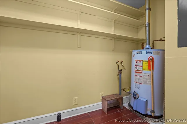 a kitchen with stainless steel appliances a refrigerator and cabinets