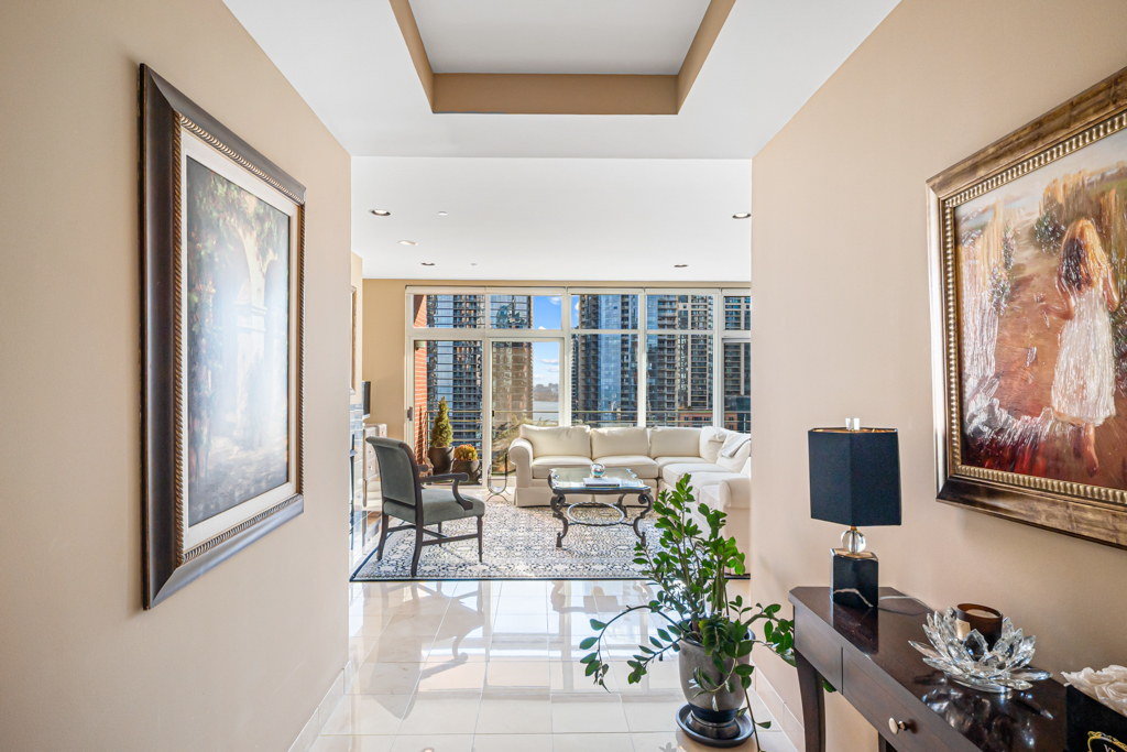 445 East North Water Street, Unit 2003 Chicago, IL 60611 - Photo 15 of 18 a living room with furniture and large window