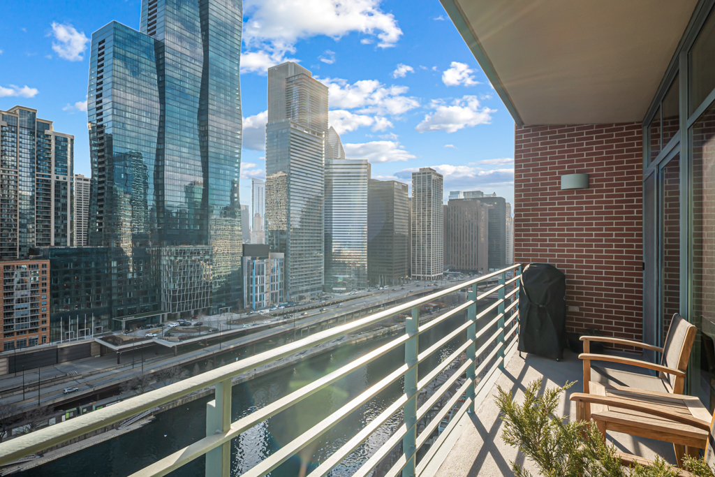 445 East North Water Street, Unit 2003 Chicago, IL 60611 - Photo 3 of 18 a view of the city from a balcony