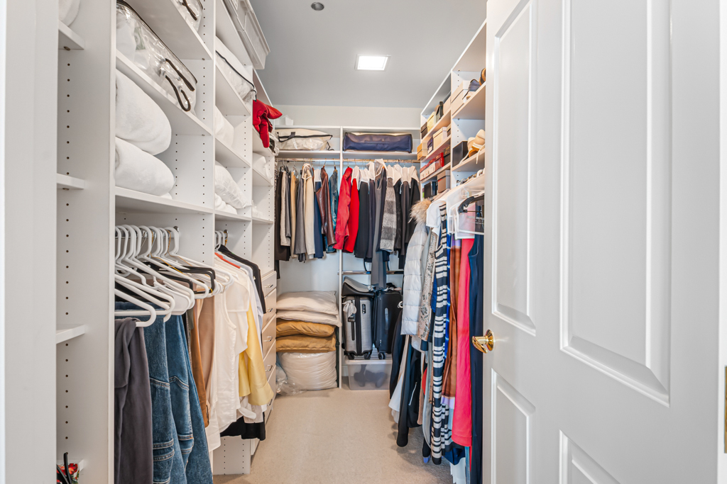 445 East North Water Street, Unit 2003 Chicago, IL 60611 - Photo 10 of 18 a view of walk in closet with clothes
