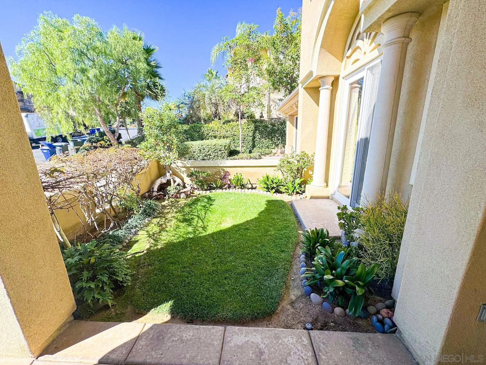 536 Quail Pointe Lane Encinitas, CA 92024 - Photo 28 of 28 a view of a garden with a chair