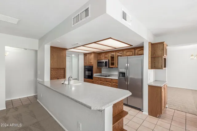 a room with a table and chairs