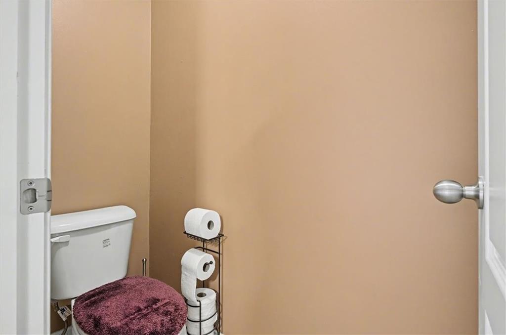 101 Oscar Lane Dallas, GA 30132 - Photo 32 of 55 a bathroom with a toilet and a shower