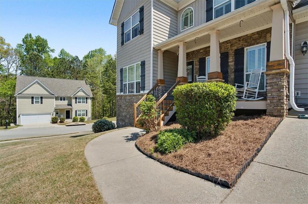101 Oscar Lane Dallas, GA 30132 - Photo 4 of 55 front view of a house with a street