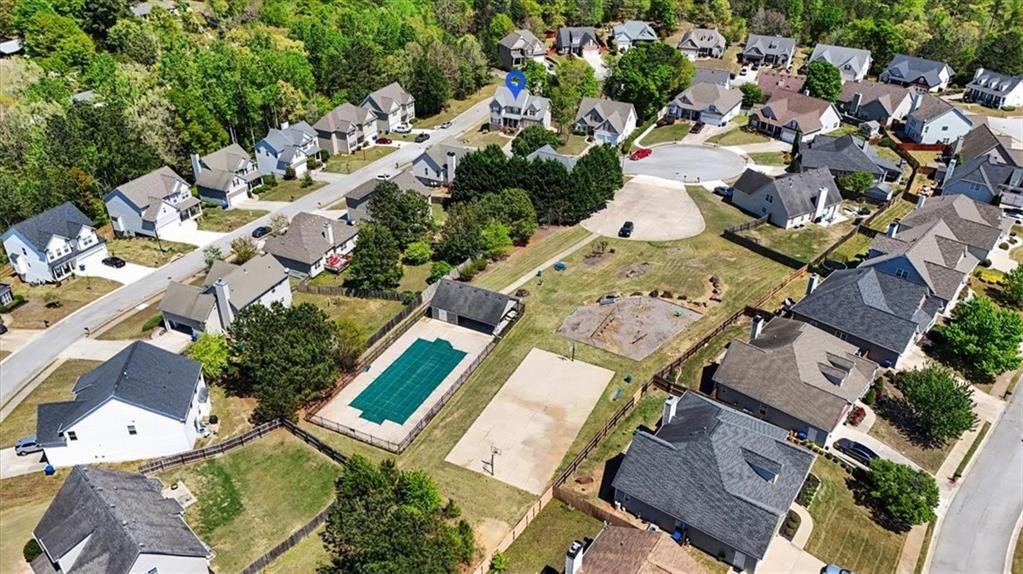101 Oscar Lane Dallas, GA 30132 - Photo 49 of 55 an aerial view of a house with a yard and outdoor seating