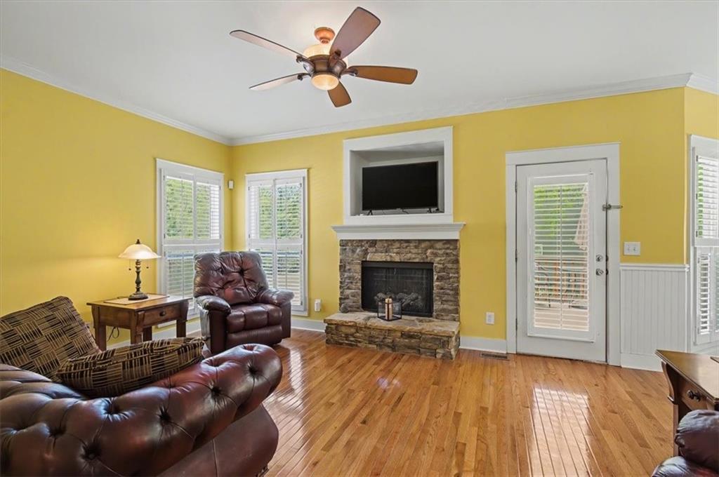 101 Oscar Lane Dallas, GA 30132 - Photo 8 of 55 a living room with furniture and a fireplace