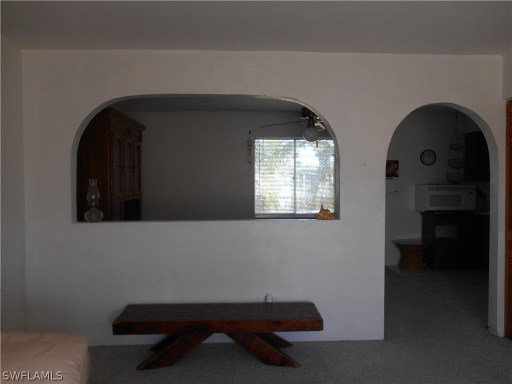 8437 Matanzas Road Fort Myers, FL 33967 - Photo 5 of 21 a room with two chair