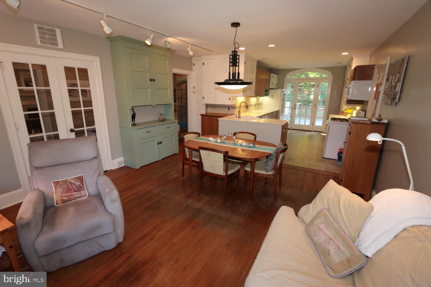 2701 Alden Road Bryn Athyn, PA 19006 - Photo 38 of 105 a living room with furniture kitchen and a wooden floor