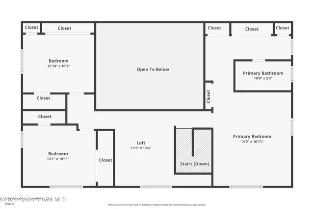 a view of a house with a yard and potted plants