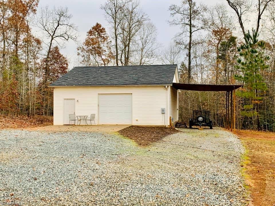 511 Beckner Road Lexington, NC 27292 - Photo 2 of 17 40x30 garage with concrete floor, fluorescent lights, heat.