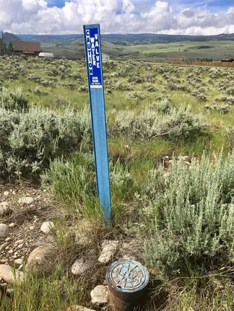 a bathroom with a shower and a mirror
