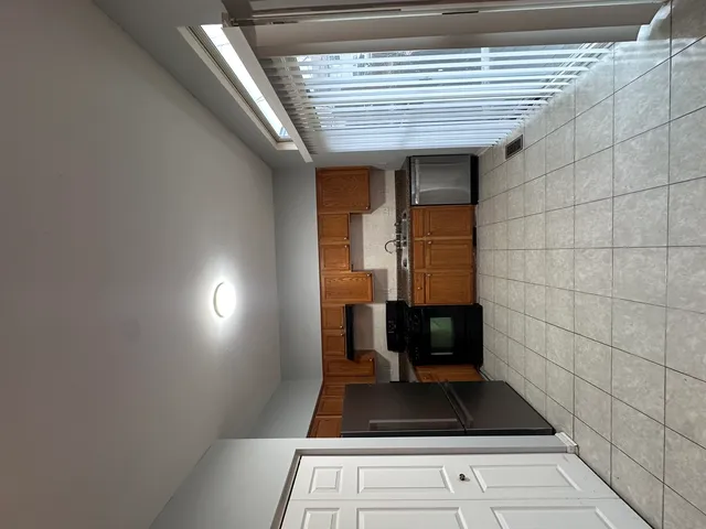a view of a livingroom with wooden floor