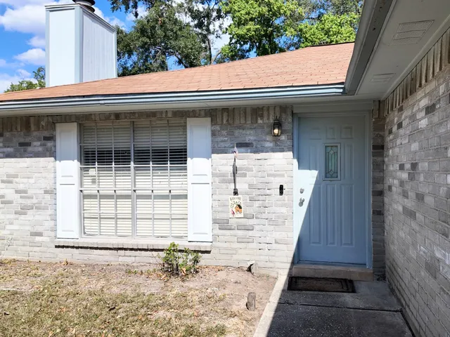 a view of a house with entrance gate