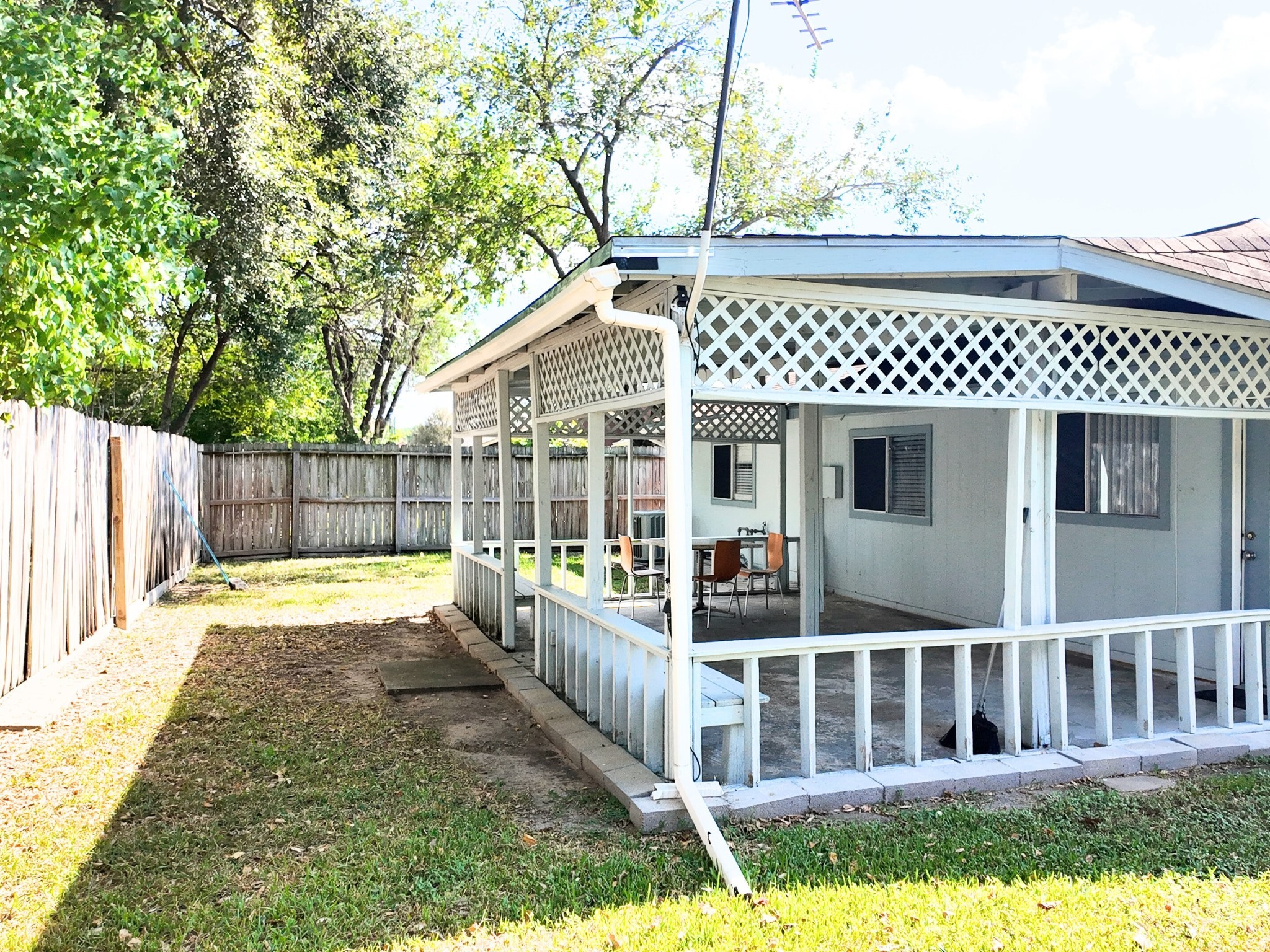 10070 Green Valley Lane Houston, TX 77064 - Photo 22 of 27 a view of a house with backyard and wooden fence