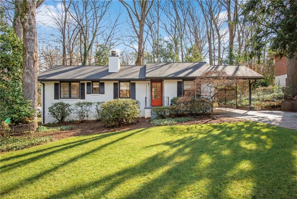 1301 Willivee Drive Decatur, GA 30033 - Photo 1 of 1 a front view of a house with a yard