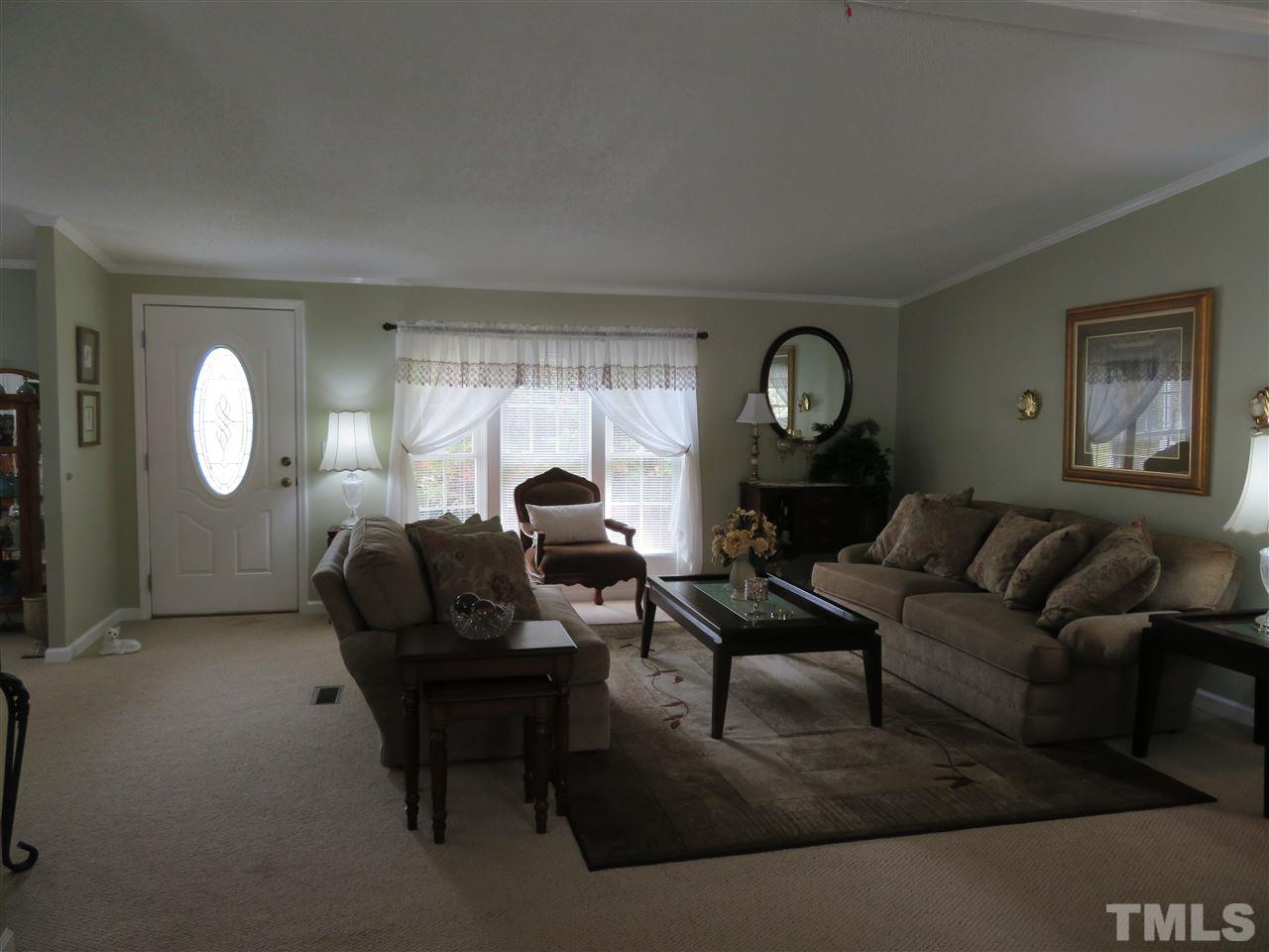 4481 Pixley Pritchard Road Timberlake, NC 27583 - Photo 12 of 25 a living room with furniture