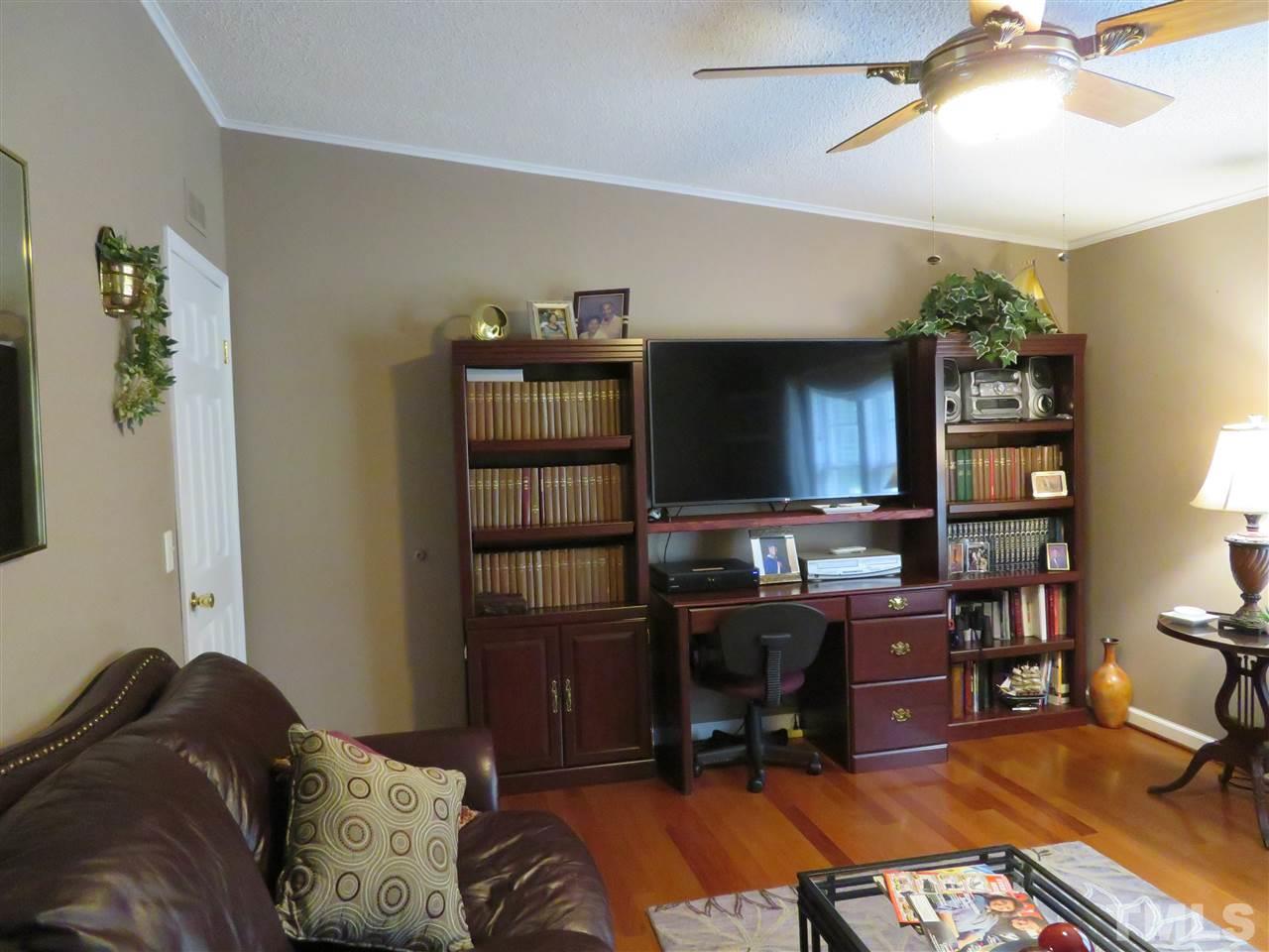 4481 Pixley Pritchard Road Timberlake, NC 27583 - Photo 14 of 25 a livingroom with workspace and a window