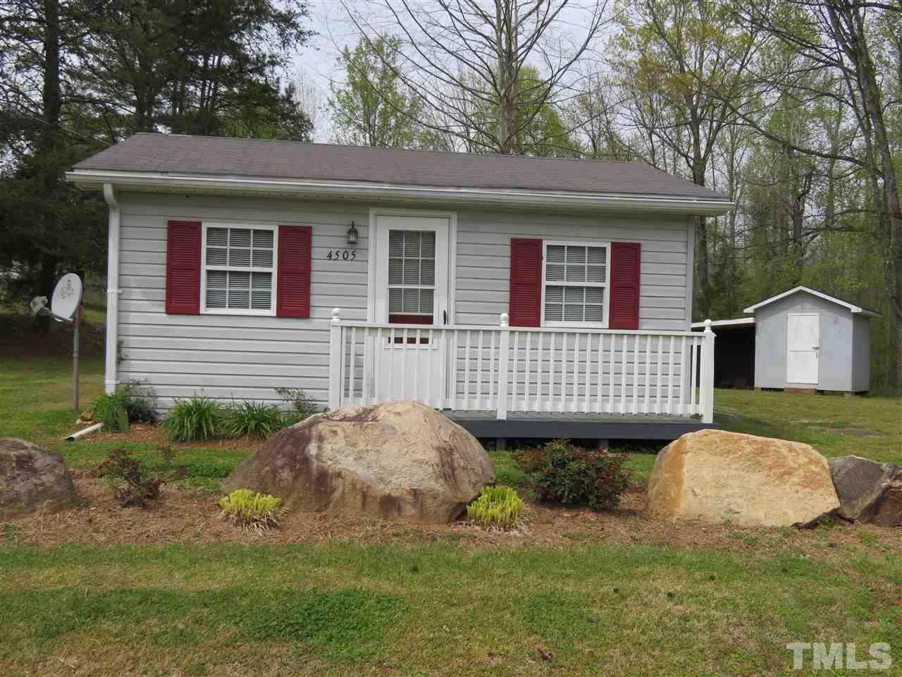 4481 Pixley Pritchard Road Timberlake, NC 27583 - Photo 20 of 25 a front view of a house with garden