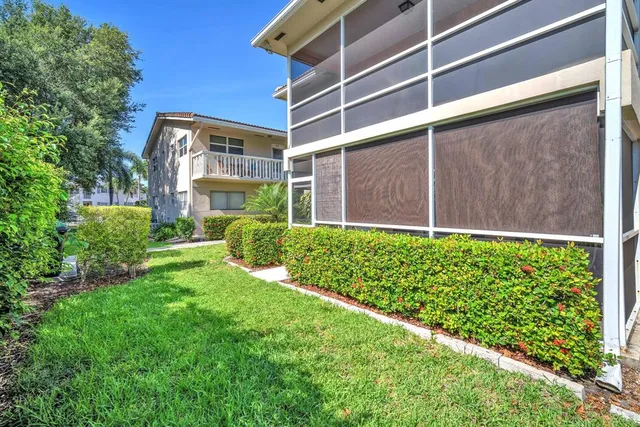 a view of a back yard of the house