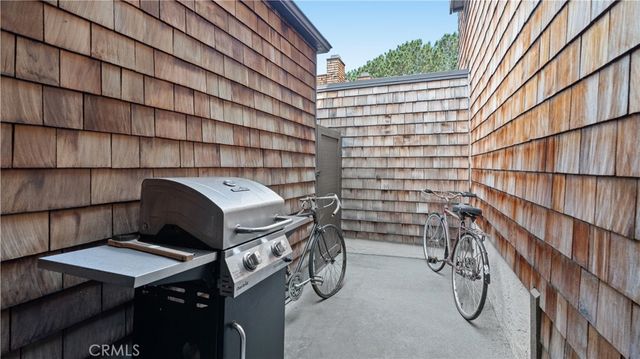 an aerial view of a houses and an outdoor space