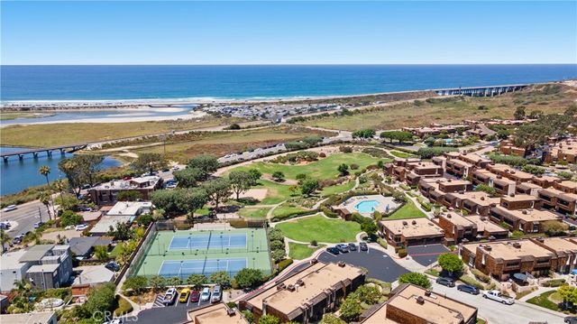 an aerial view of residential house with outdoor space