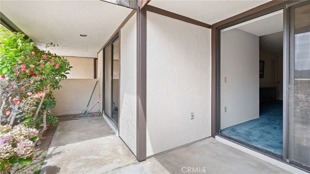 a room with furniture and a wooden floor