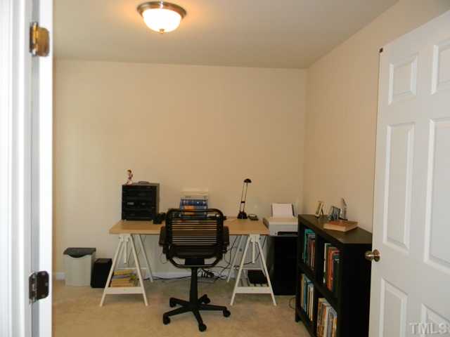 2018 Kedvale Avenue Raleigh, NC 27617 - Photo 14 of 18 a view of a workspace with furniture
