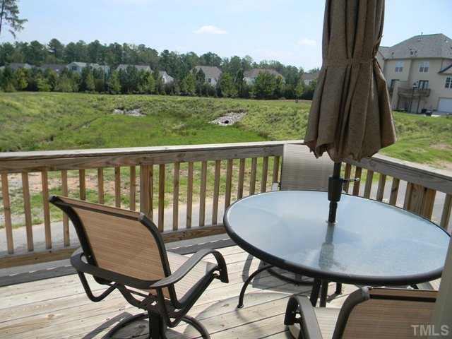 2018 Kedvale Avenue Raleigh, NC 27617 - Photo 16 of 18 a view of a chairs and table in patio
