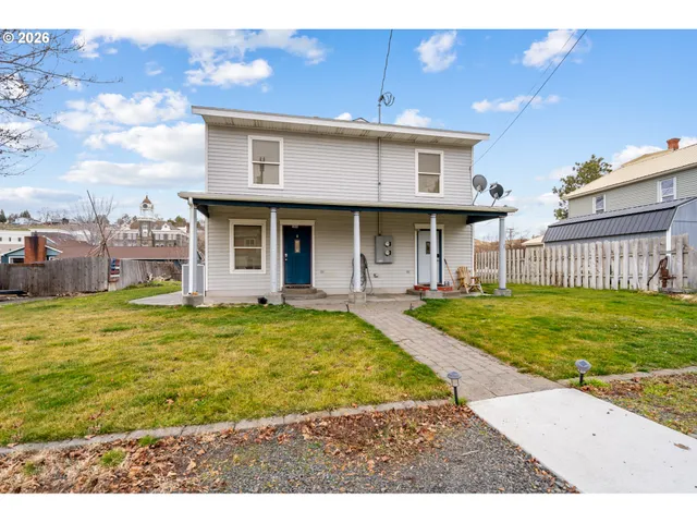 a house view with a outdoor space