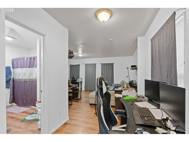 a workspace with furniture and window