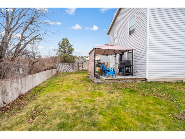 a view of a swimming pool with an outdoor space