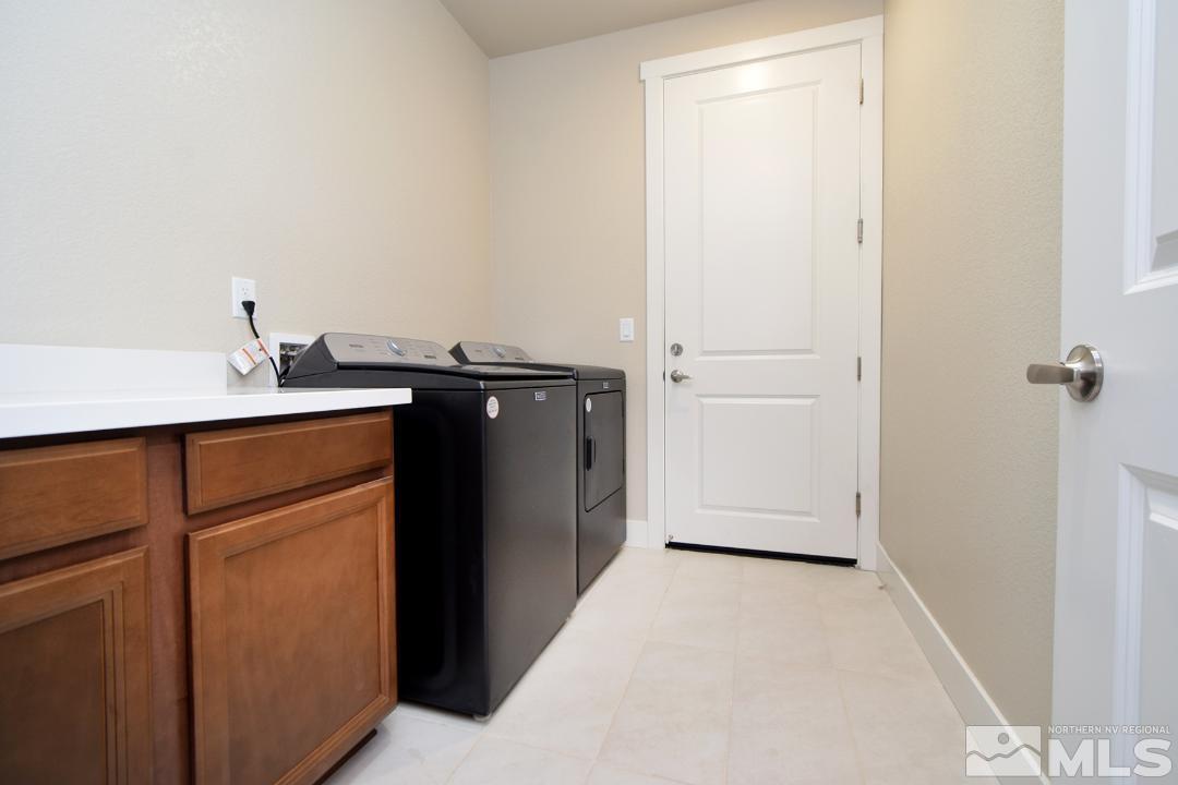 200 Paloma Ranch Court Reno, NV 89510 - Photo 11 of 27 a kitchen with a sink and cabinets