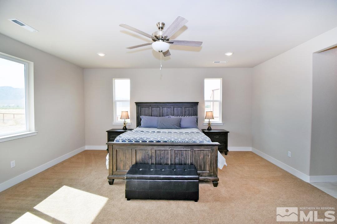 200 Paloma Ranch Court Reno, NV 89510 - Photo 15 of 27 a bedroom with a bed and window