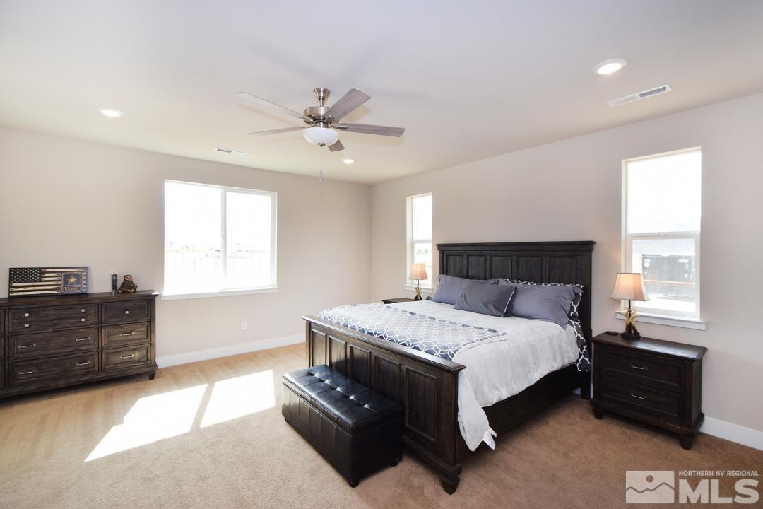 200 Paloma Ranch Court Reno, NV 89510 - Photo 17 of 27 a bedroom with a bed and window