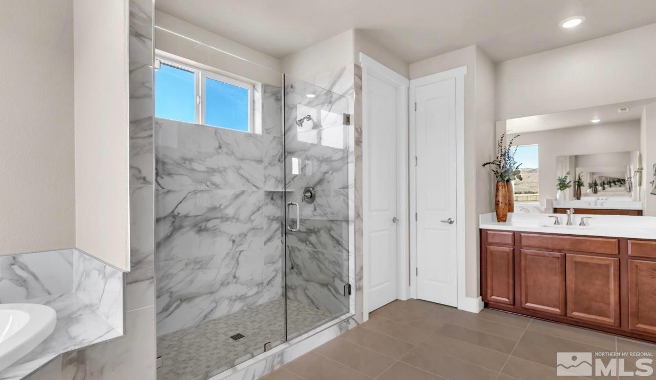 200 Paloma Ranch Court Reno, NV 89510 - Photo 20 of 27 a bathroom with a shower and a sink