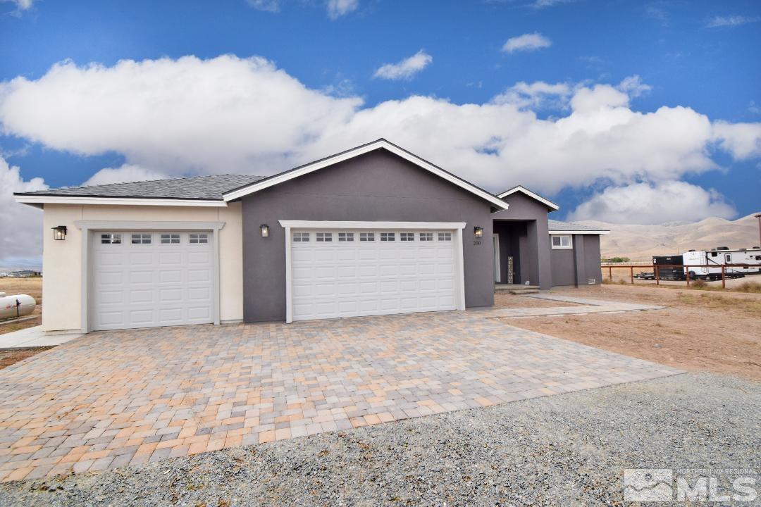 200 Paloma Ranch Court Reno, NV 89510 - Photo 2 of 27 a view of a house with a yard