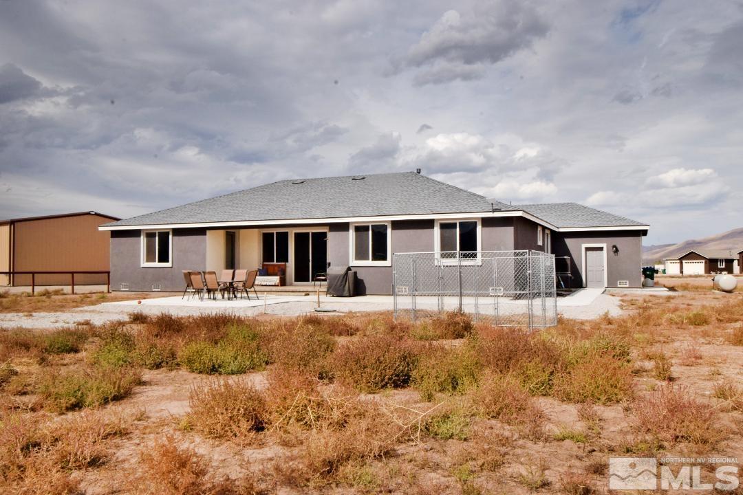 200 Paloma Ranch Court Reno, NV 89510 - Photo 22 of 27 a front view of a house with yard covered in snow