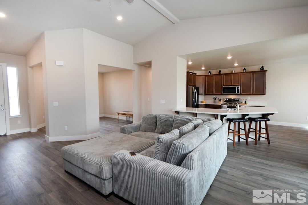 200 Paloma Ranch Court Reno, NV 89510 - Photo 4 of 27 a living room with furniture and kitchen view