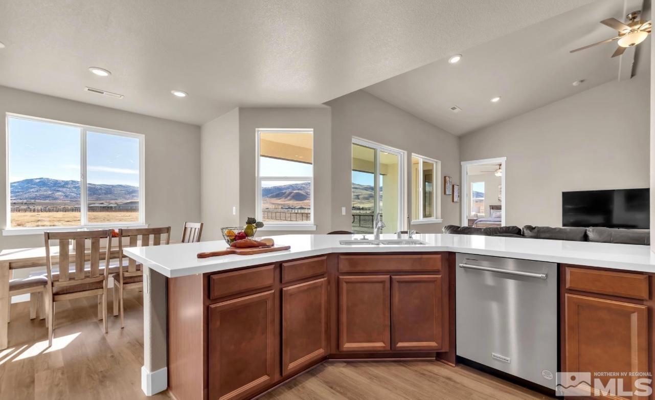 200 Paloma Ranch Court Reno, NV 89510 - Photo 10 of 27 a kitchen with a sink stove and cabinets