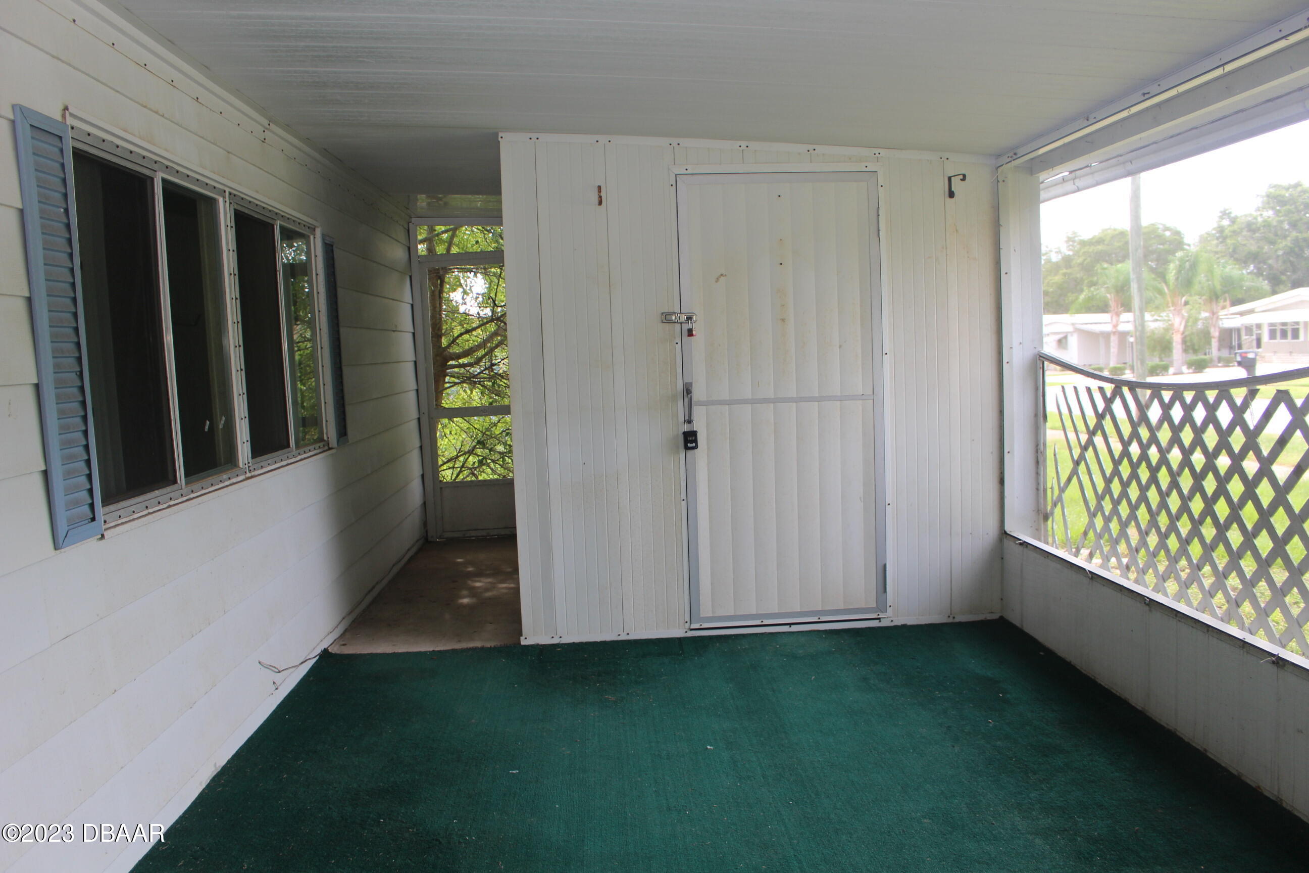 780 Rolling Hills Drive Port Orange, FL 32129 - Photo 12 of 15 a view of an empty room with a window