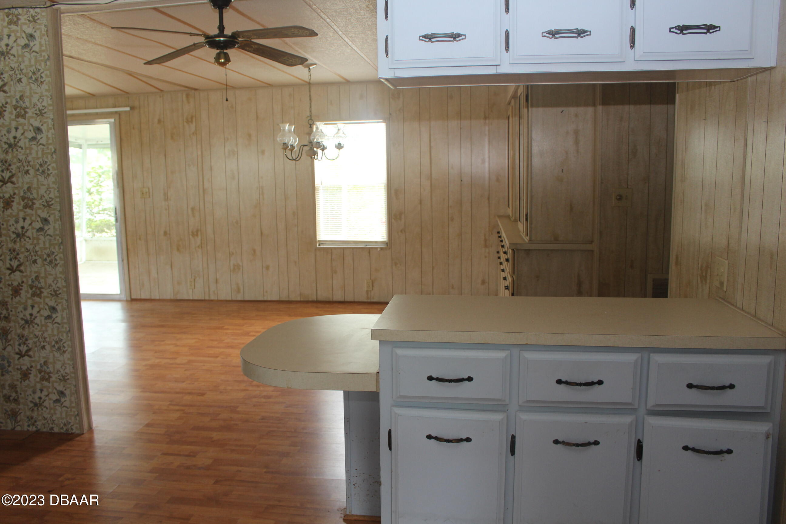 780 Rolling Hills Drive Port Orange, FL 32129 - Photo 3 of 15 a bathroom with a sink and a mirror