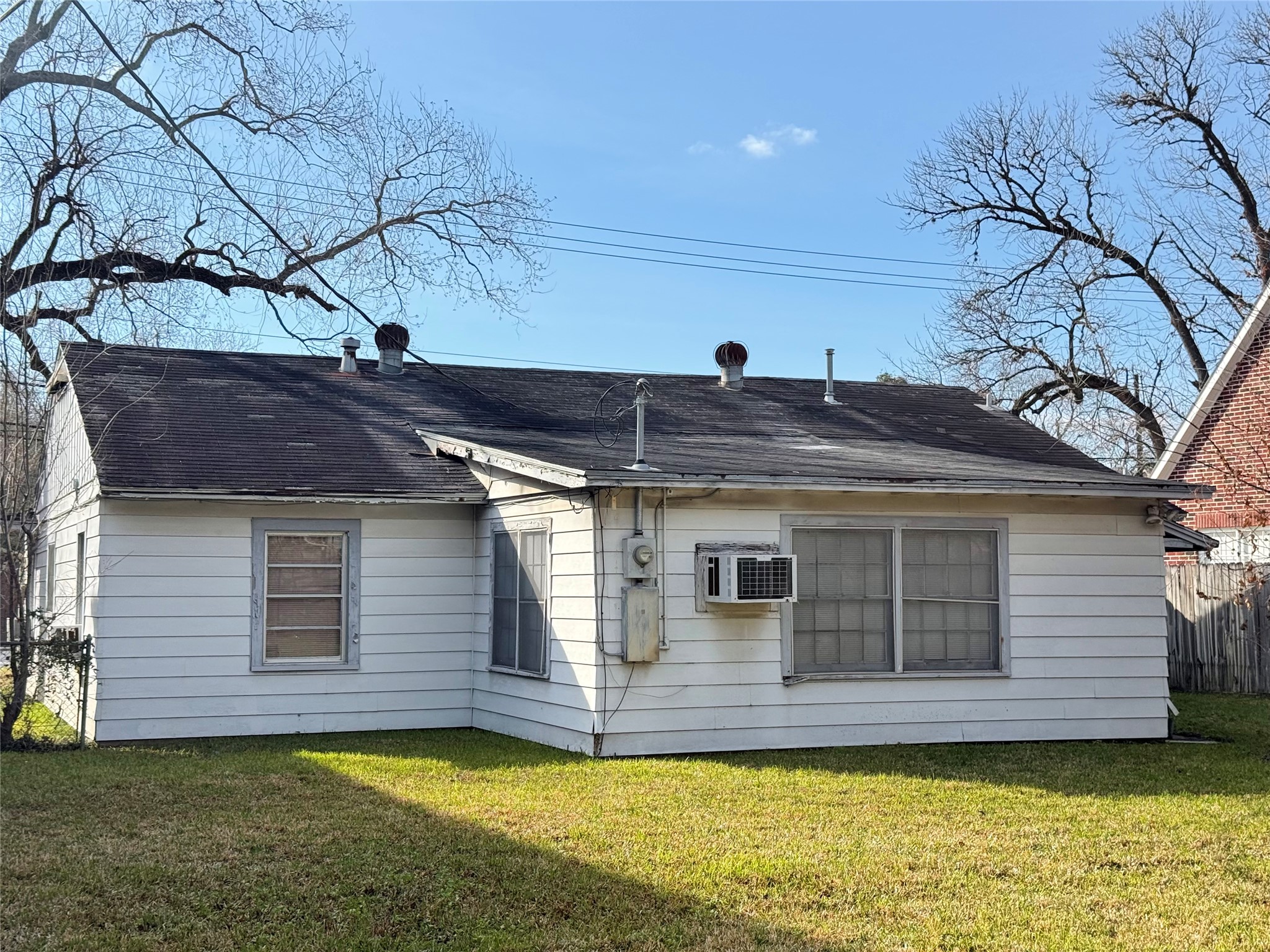 7309 South Rice Avenue Bellaire, TX 77401 - Photo 3 of 6 a house view with a garden space