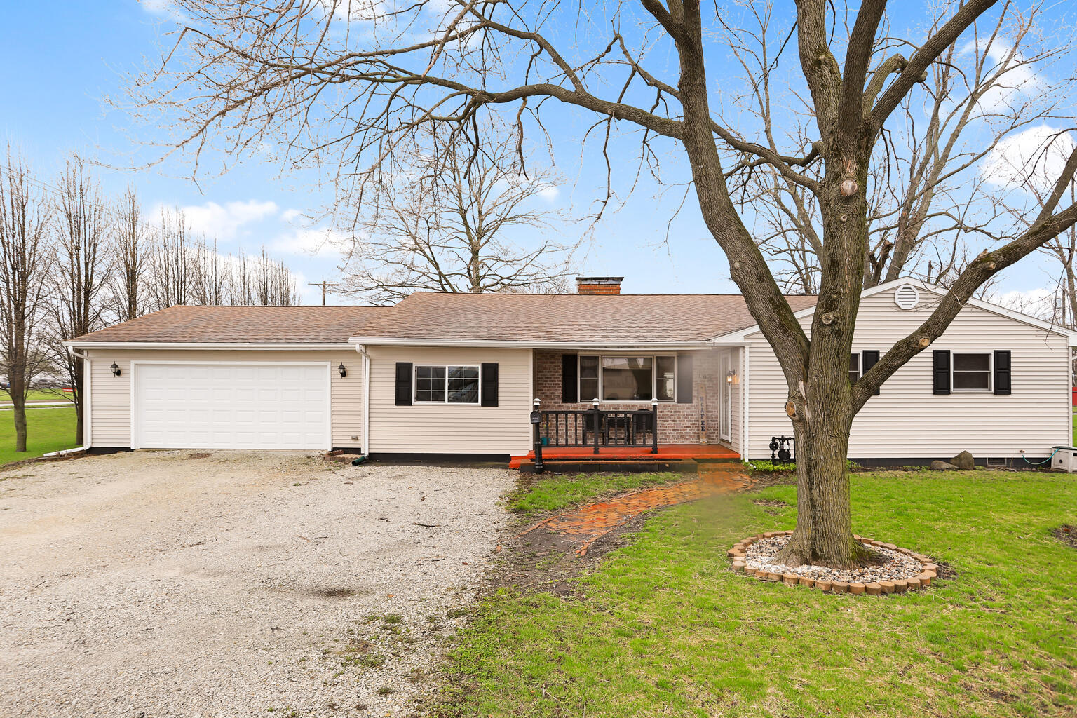 103 Maple Street Gibson City, IL 60936 - Photo 1 of 1 a house with garden in front of it