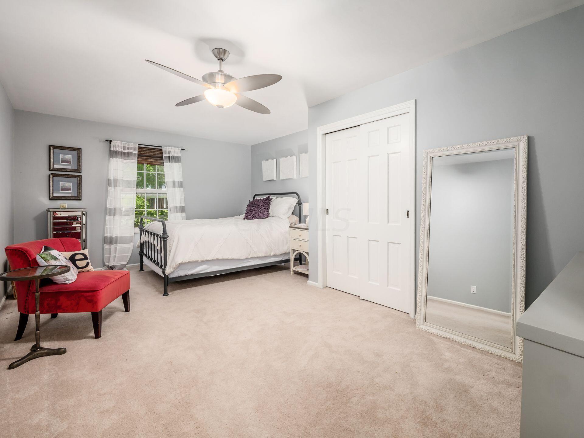 2711 Folkstone Road Columbus, OH 43220 - Photo 39 of 62 Plush carpet, shelves in closet, paddle fan with light