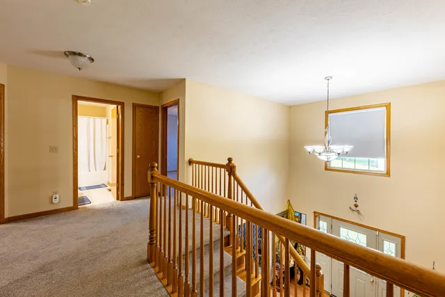 a view of hallway with livingroom