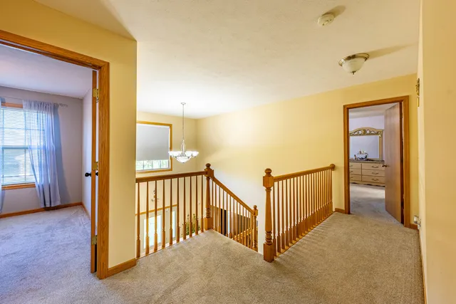 a view of a hallway with closet area