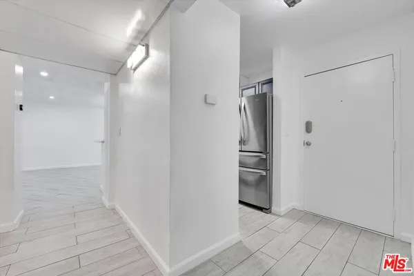 a view of a kitchen with a sink