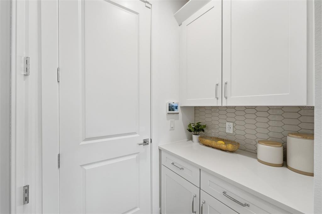 2430 Park Ridge Street Apopka, FL 32712 - Photo 18 of 49 a kitchen with a sink and cabinets